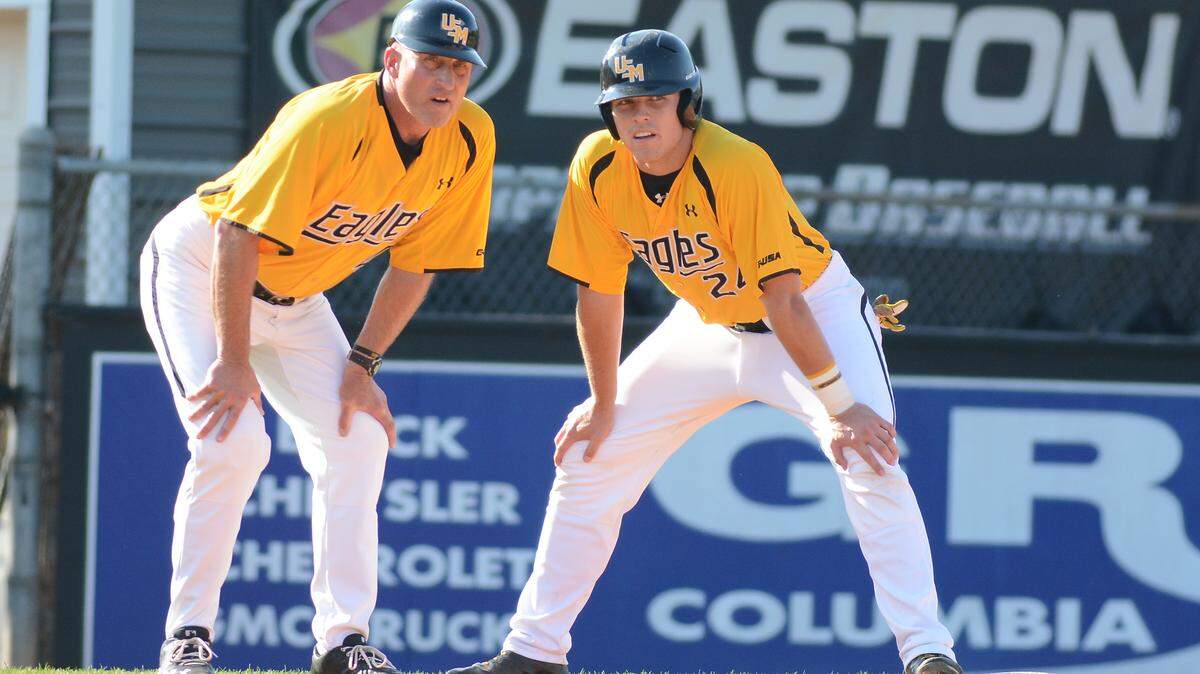 MATT BUSH/PINEBELTSPORTS.COM 
 Southern Miss head coach Scott Berry, left, and junior outfielder Dylan Burdeaux will take on rival South Alabama at 7:05 p.m. Wednesday at MGM Park in Biloxi.