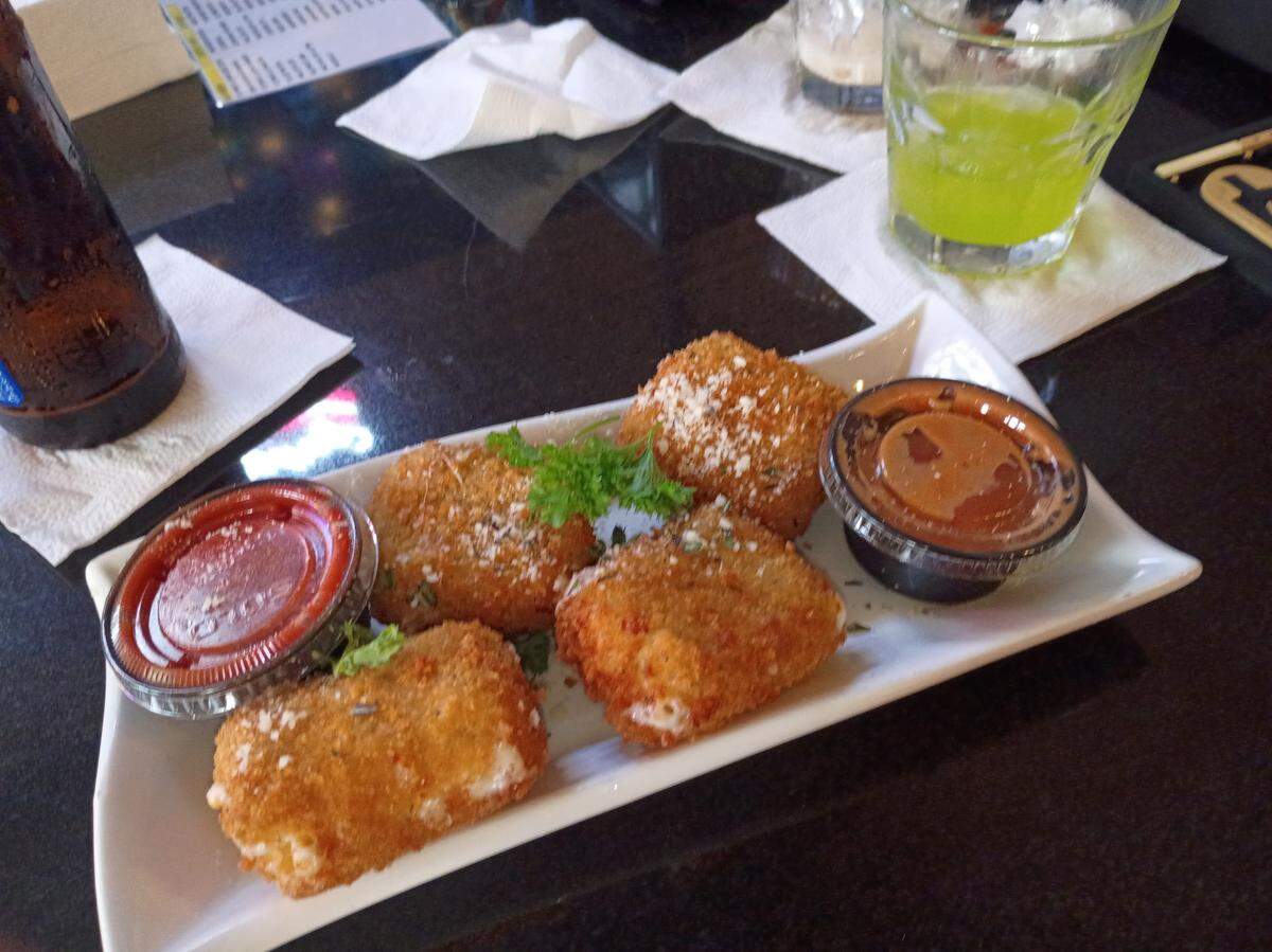 Mozzarella “sticks” are among the classic favorites, at Tony’s Brick Oven Pizzeria, which is open again in downtown Gulfport.