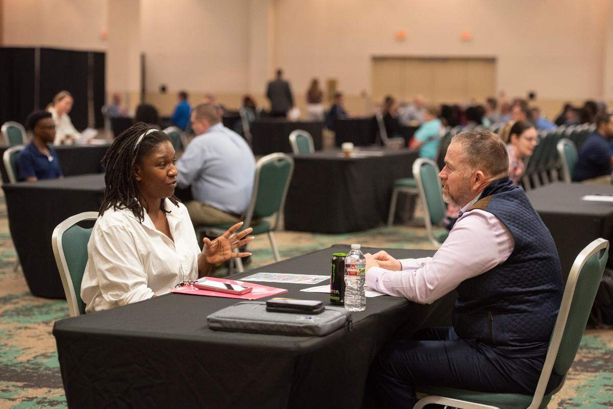 A job applicant is interviewed during a Buc-ee’s hiring fair at the Mississippi Coast Coliseum on Wednesday, April 2, 2025.