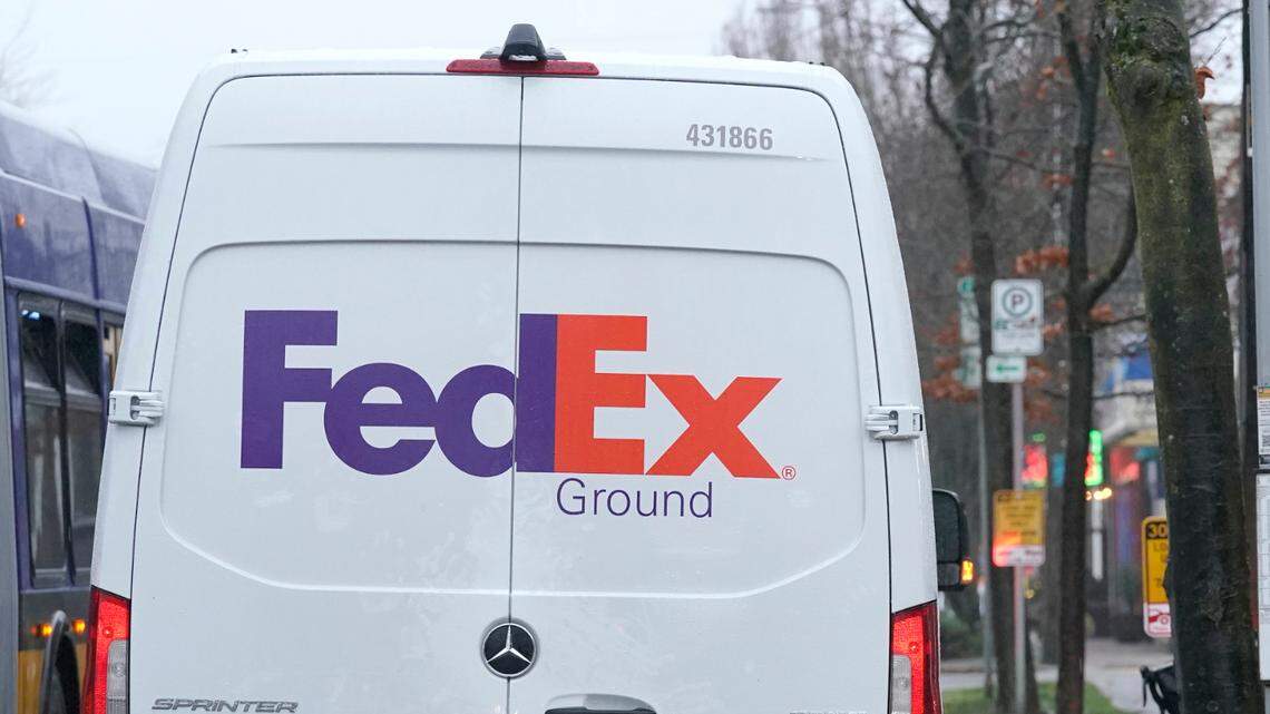 The FedEx driver was trying to pass a vehicle in a no-pass zone, police said. (AP Photo/Ted S. Warren)