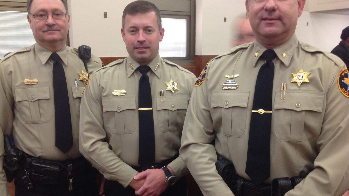 KAREN NELSON/SUN HERALDWearing the new uniform for Jackson County deputies are Sgt. Randy Neal, left, Chief Deputy John Ledbetter and Maj. Ray Bates.