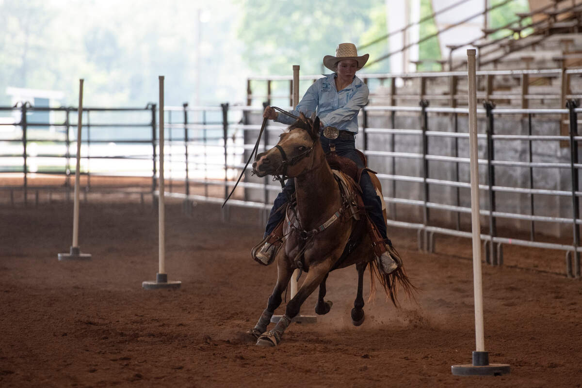 Kinsley McBride practices with her horse Houdini at the Harrison County Fairgrounds on Thursday, June 13, 2024.
