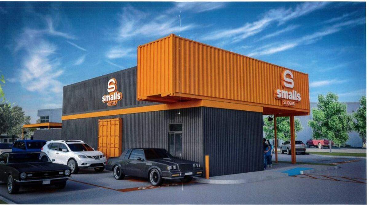 A rendering shows the orange and black color scheme of Smalls Sliders, a restaurant coming to the Biloxi beach.