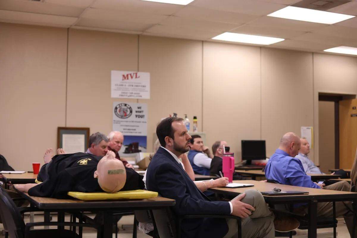 NEMCC’s workforce council meets into a classroom next to mannequins and a truck driving simulator last month.