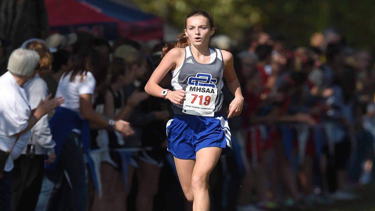 CHRIS TODD/SPECIAL TO THE SUN HERALDOcean Springs' Sadie Smith and the Lady Greyhounds won the Class 6A state cross country championship.