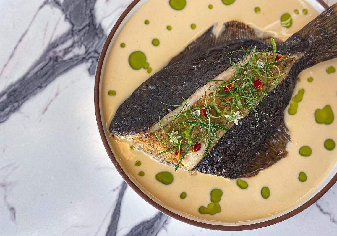 A whole Gulf flounder is stuffed with shrimp and crab on the new fall menu at Radish restaurant in Long Beach.