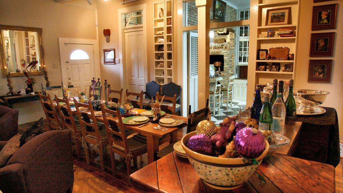 TIM ISBELL/THE SUN HERALD 
 The entertainment room at Chateau Blessey features a long table just outside of the kitchen.