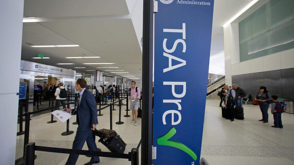 TSA is reducing the TSA PreCheck enrollment and renewal fee from $85 to $78, the agency announced. Here’s what to know. (AP Photo/Eric Risberg)