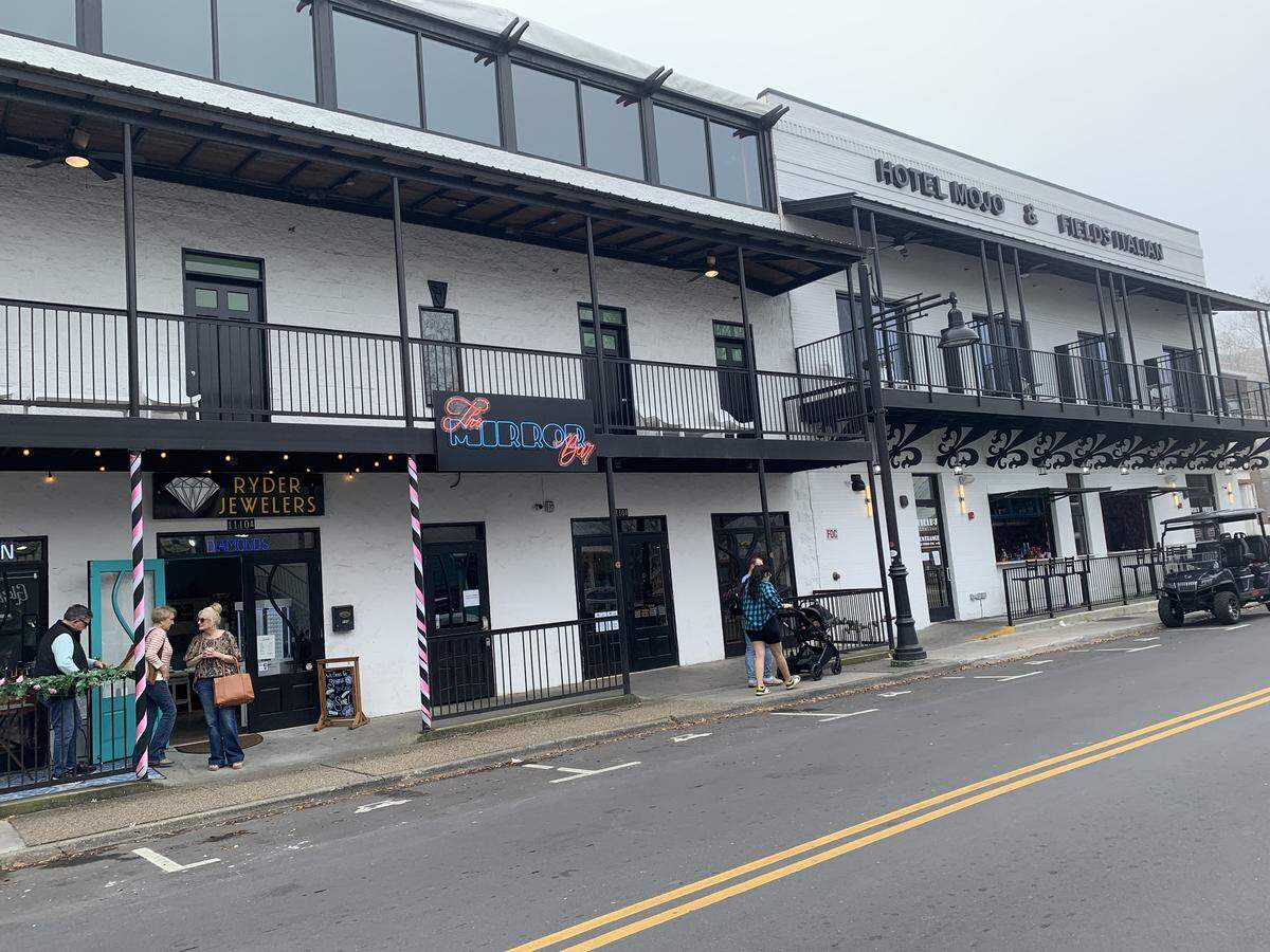 Eat, stay, read and sip a coffee all in one place in downtown Ocean Springs. Cat Island Coffeehouse and Pass Christian Books (center), opened Thursday adjacent to Field’s Italian.