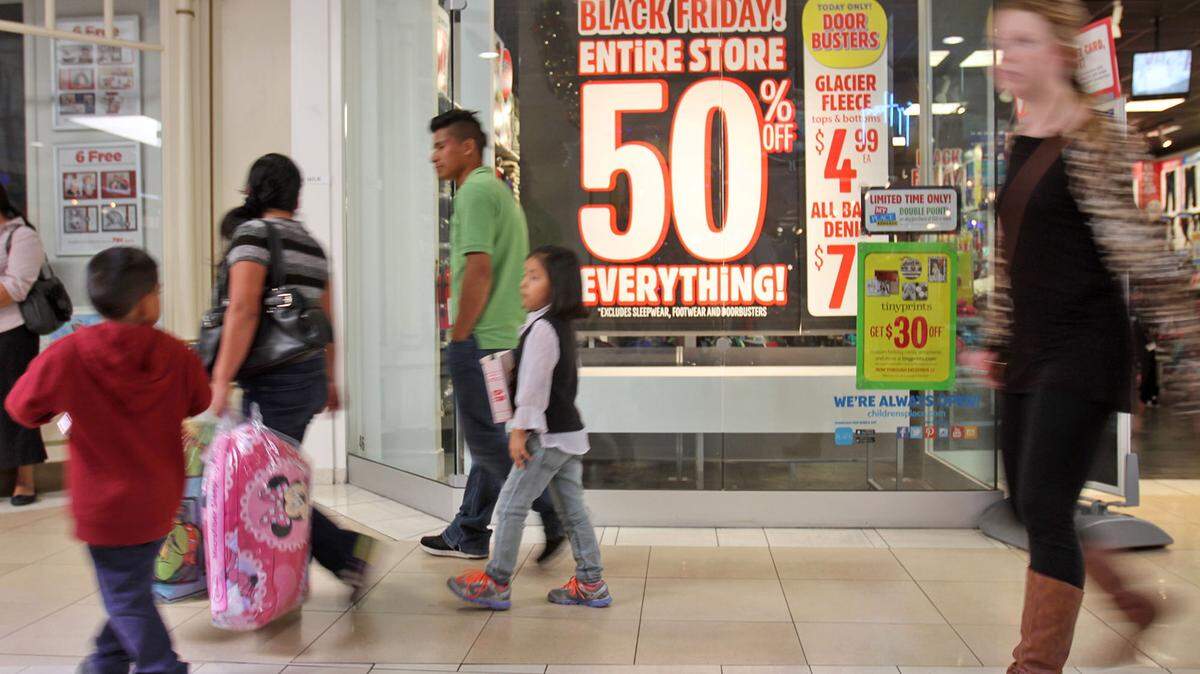 JOHN FITZHUGH/SUN HERALD/2014Shoppers look for Black Friday deals at Edgewater Mall in Biloxi last year. The mall and many of the national stores will open at 6 p.m. Thanksgiving Day for bargain hunters, and the sales go all weekend.