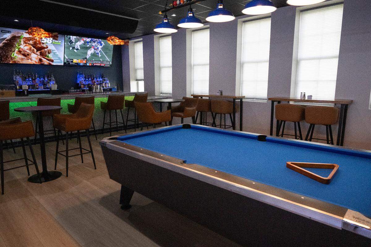 The bar and pool table at Hippie Fish at Centennial Plaza in Gulfport on Thursday, June 26, 2025.