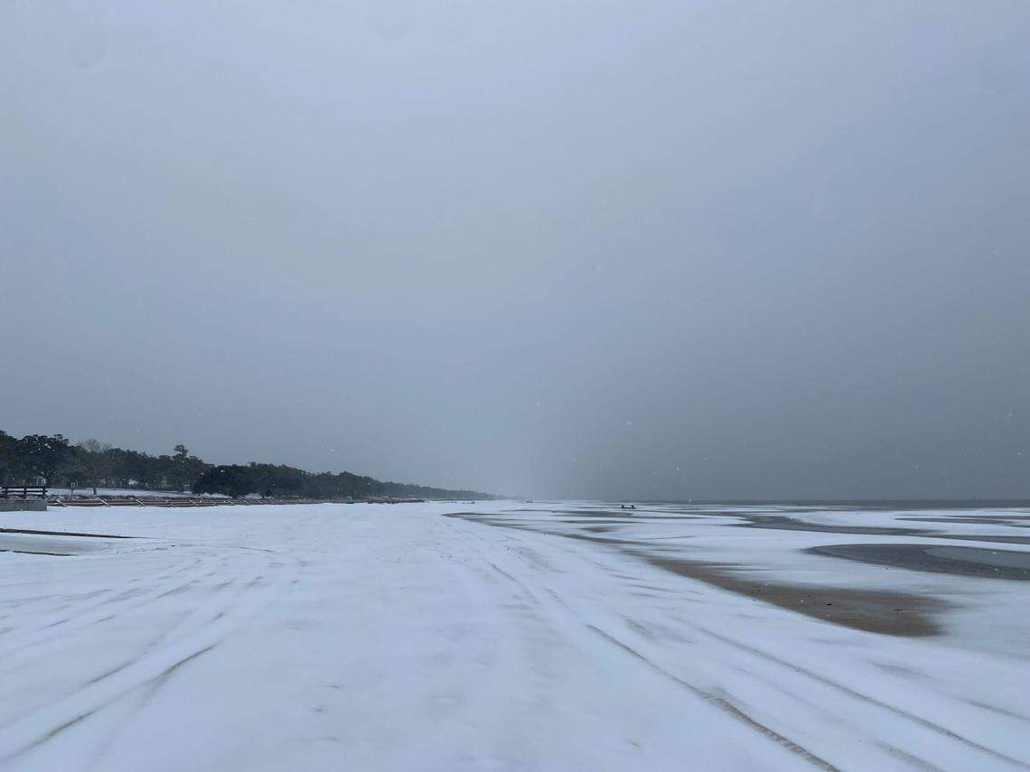 Snow covers the beach Tuesday, Jan. 21, 2025, in Pass Christian.