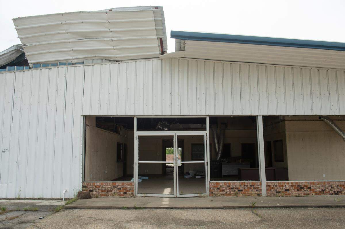 A building along Main Street in Moss Point that was damaged by a tornado in June 2023 remains damaged on Tuesday, June 18, 2024.