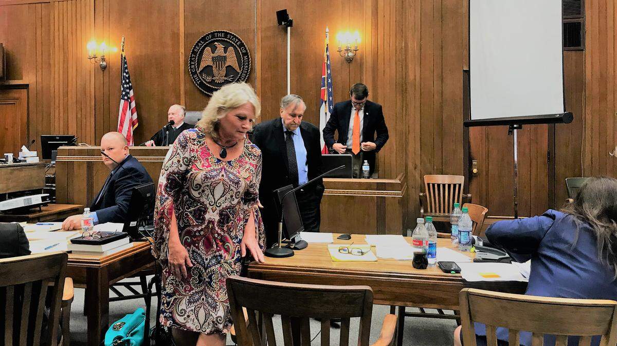 Former George County jail nurse Carmon Brannan returns to her seat after speaking to Special Judge Richard McKenzie during her manslaughter trial in Warren County on July 26, 2018. She is accused in the death of William Joel Dixon.