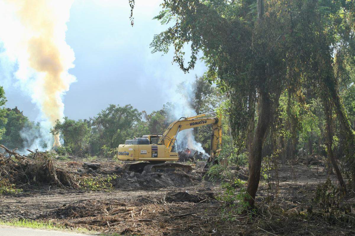 Broadwater Development LLP is cleaning out acreage on the east side of Iris Street just north of the CSX railroad tracks in Biloxi to improve visibility for the city and residents of the area on Tuesday, Sept. 17, 2024. Homeless people who were on the property were forced to relocate after neighbors complained about gun shots and other disruptive behavior. The former Broadwater Resort property encompasses 266 acres where homeless people have been camping for years.