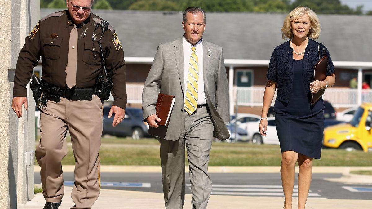 TODD J. VAN EMST/OPELIKA-AUBURN NEWSMike Hubbard and Susan Hubbard walk to the Lee County Justice Center to start the second week of the ethics trial of Alabama Speaker Mike Hubbard on Tuesda in Opelika, Ala.
