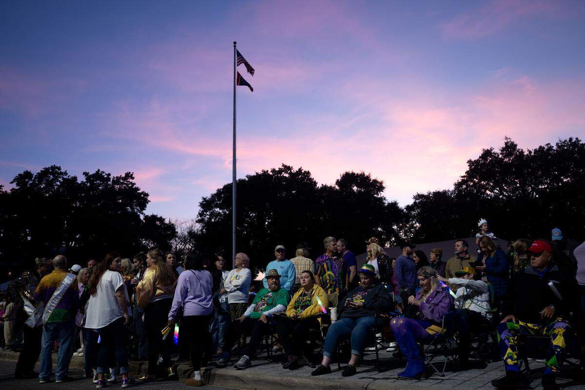 A crowd gathers in front of Biloxi City Hall for a parade during a 12th Night Celebration in Biloxi on Monday, Jan. 5, 2026.