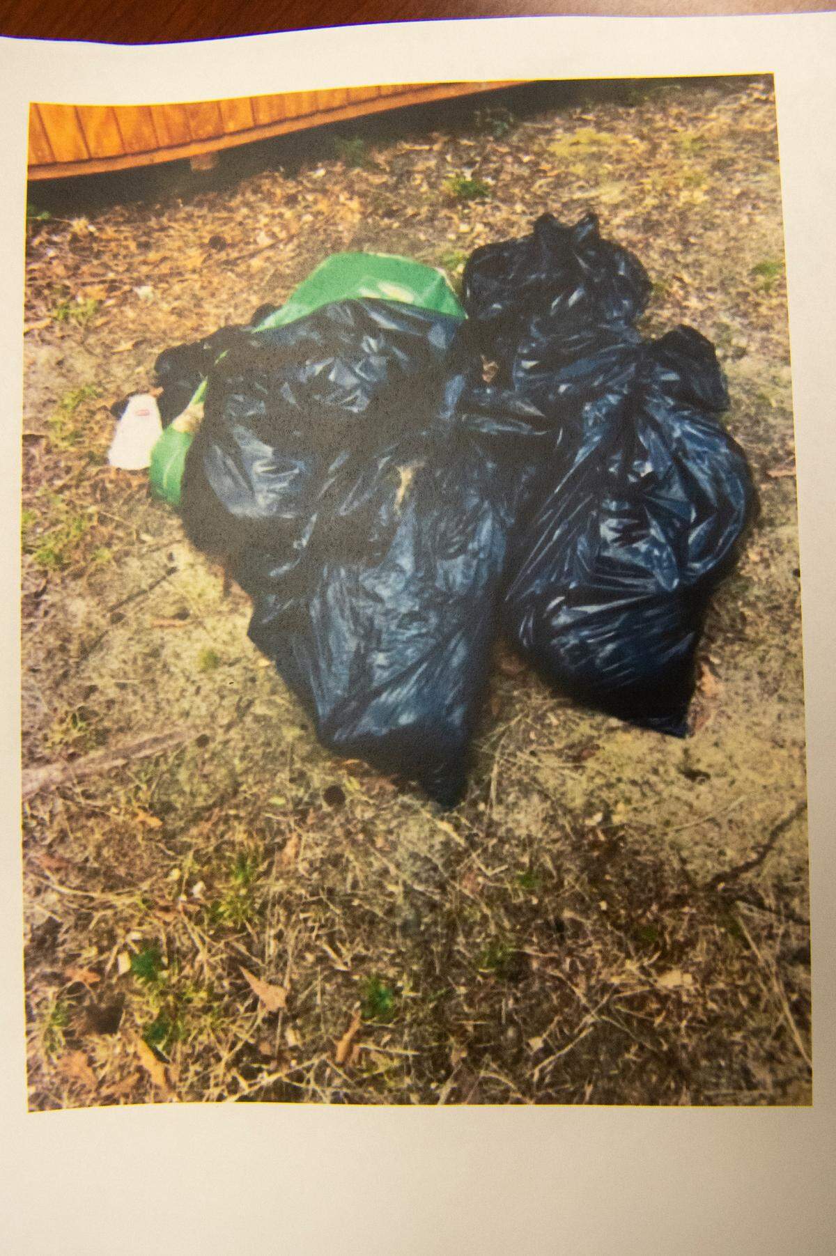 A photo taken by a Harrison County Sheriff’s Department Animal Control officer shows dead dogs wrapped in trash bags found on a property where Jessica Collins kept several dead dogs in Saucier. Collins pleaded no contest to 10 counts of simple animal cruelty to a domesticated dog at Harrison County Justice Court in Gulfport on Friday, Aug. 11, 2023.
