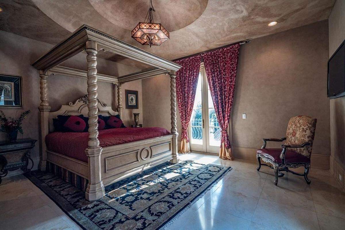 The mansion’s upper-level includes four bedrooms, with four more bedrooms on the main level.