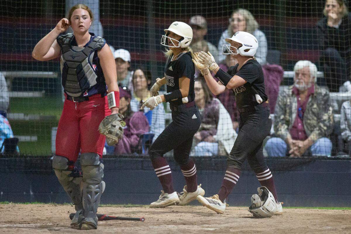 George County players react after scoring during a softball game between George County and Hancock at Hancock High in Kiln on Tuesday, March 18, 2025.