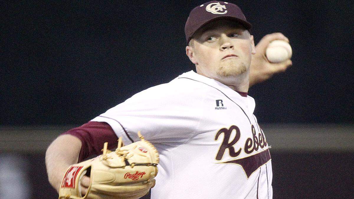 TIM ISBELL/SUN HERALD 
 George County pitcher Walker Robbins fires a pitch against D'Iberville, Friday, Apr. 15, 2016.