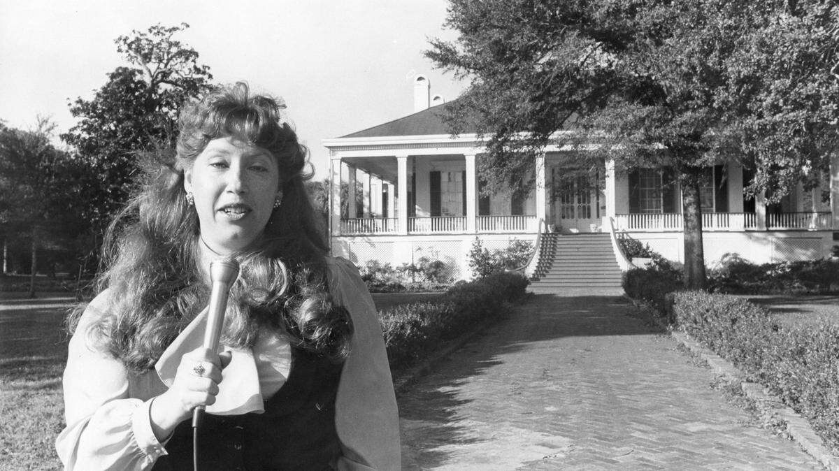 SUN HERALD/ FILEIn 1984, Kat Bergeron does a Gulf Coast Chronicles video in front of Biloxi's Beavoir for a project that melded print and TV journalism for the Sun Herald.