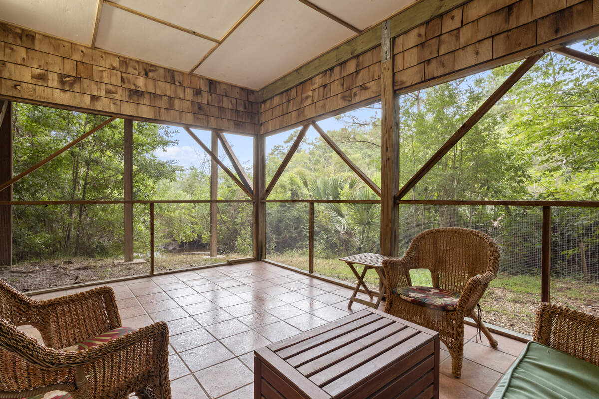 The Ishee house on Brumbaugh Road in Ocean Springs features a screened deck on the first floor and an open deck on the second floor for enjoying the scenery around Davis Bayou.