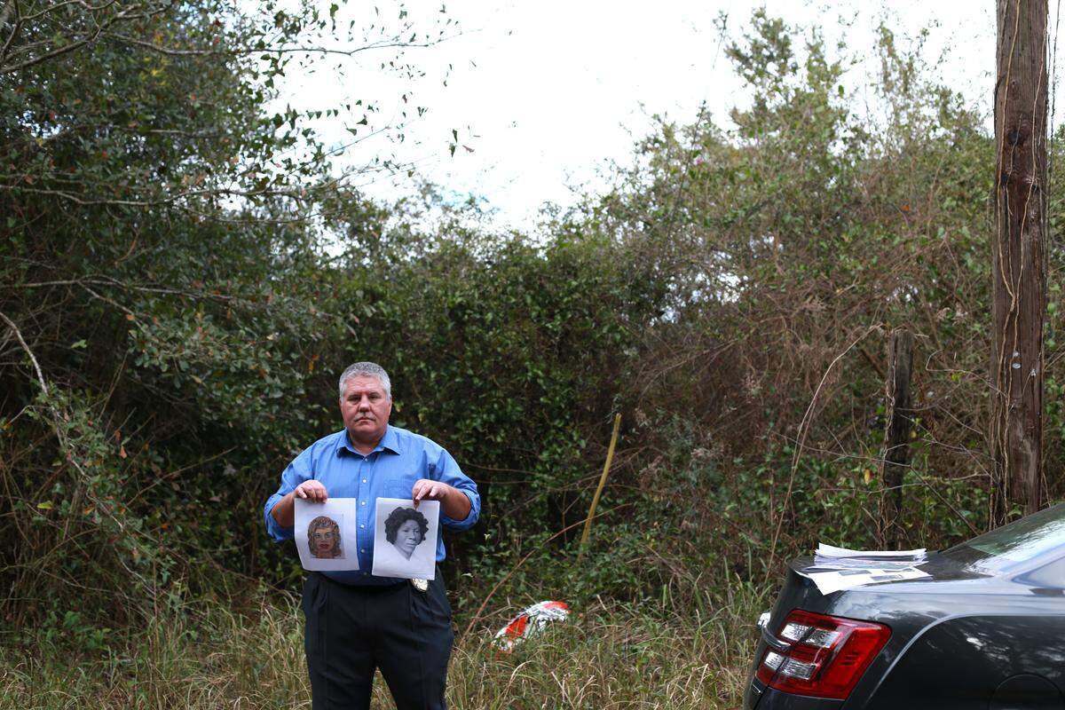 Pascagoula police Lt. Darren Versiga holds a sketch made by suspected serial killer Samuel Little, left, and a forensic rendering of a woman Little says he killed in the 1970s.