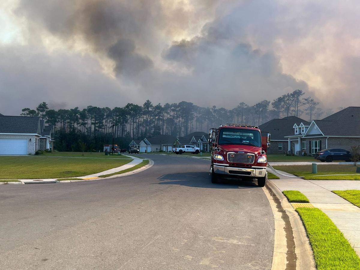 A woods fire burns in Jackson County on Thursday.