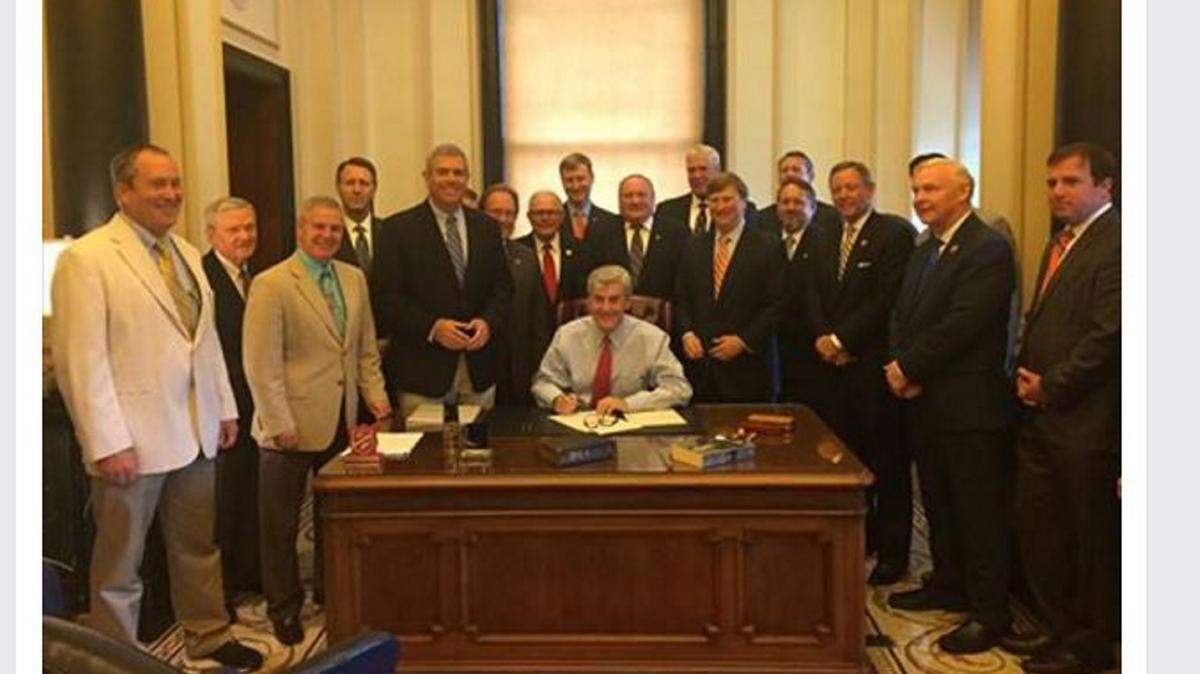 SUN HERALD 
 Gov. Phil Bryant signs a bill that will require appointment of all public school superintedents.