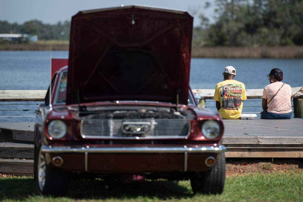Spectators in downtown Moss Point during Cruisin’ The River City, a Cruisin’ The Coast event on Tuesday, Oct. 8, 2024.