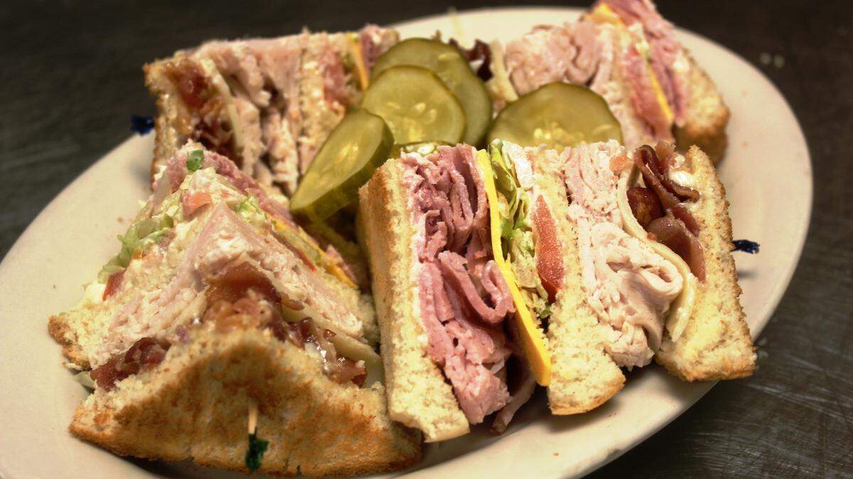 JULIAN BRUNT/SPECIAL TO THE SUN HERALDA club sandwich is classic Americana.