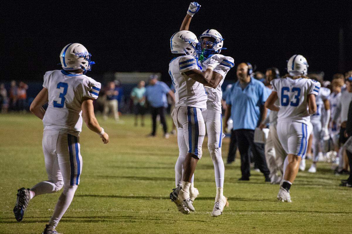 Ocean Springs players celebrate after a play during a game against Gulfport at Milner Stadium in Gulfport on Friday, Oct. 27, 2023. Ocean Springs beat Gulfport 30-7.