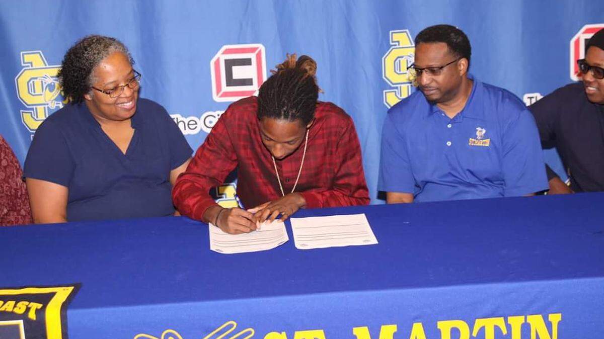 St. Martin senior D.J. Dismuke signs to play soccer at Mississippi Gulf Coast Community College.