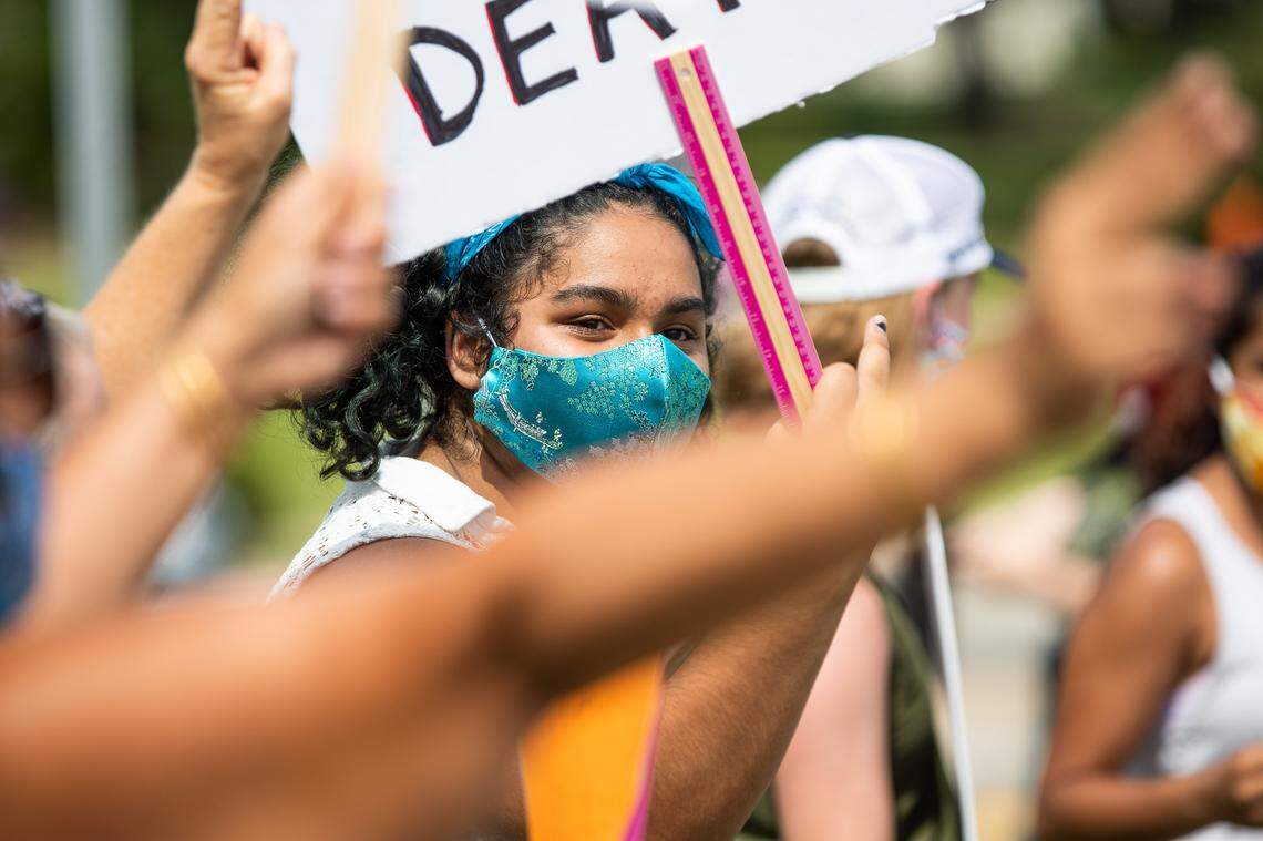 Peaceful protesters lined the sidewalk of Beach Boulevard in Biloxi on Sunday, May 31st, 2020, to demonstrate against police brutality. The protest was one of hundreds taking place across the country following the death of George Floyd.