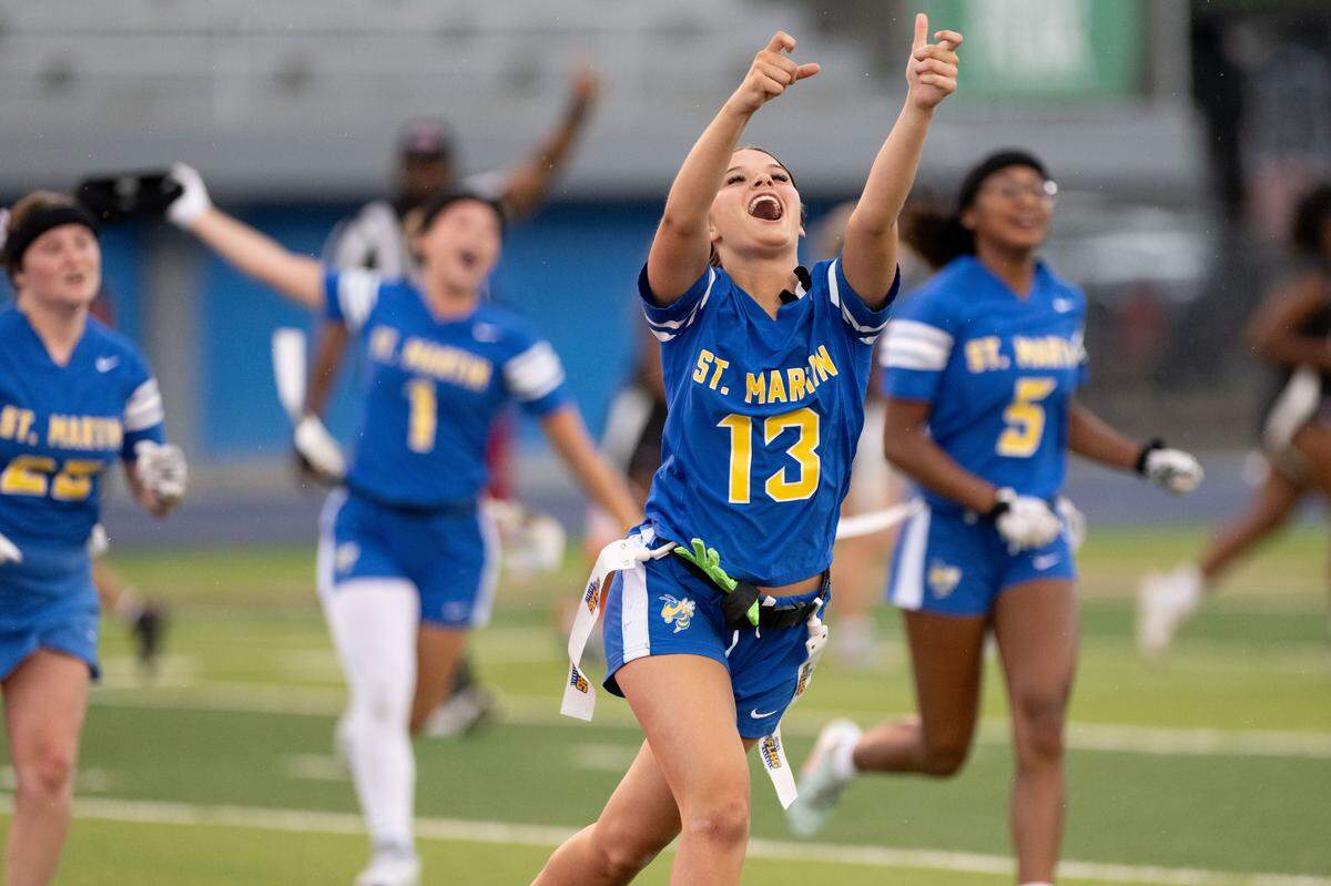 St. Martin’s Molly Noblitt (13) celebrates an interception during a flag football playoff game at Pascagoula High School on Thursday, April 30, 2026.