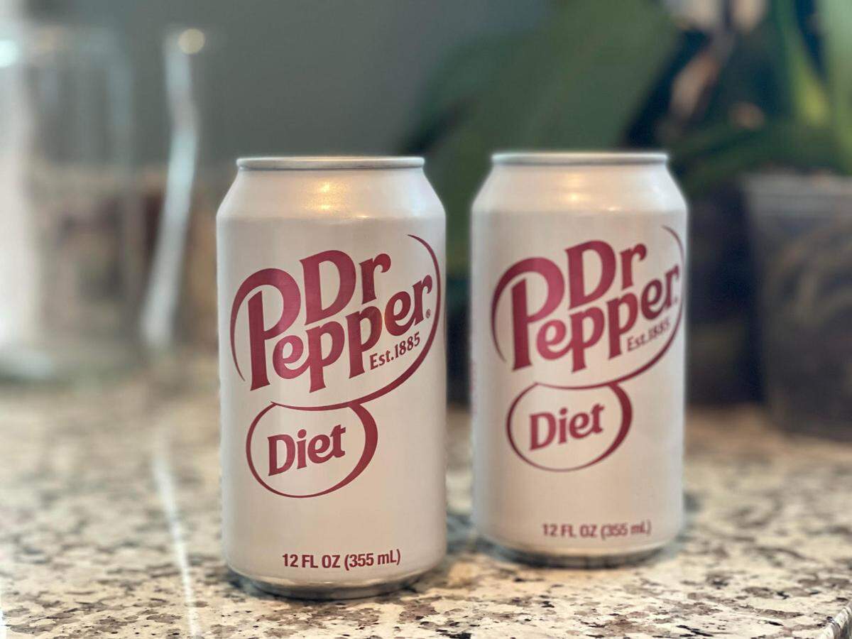 Two cans of Diet Dr. Pepper.