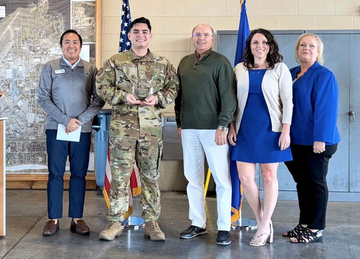 Keesler Federal’s Community Development Officer Anthony Abella, Senior Airmen Josie Velazquez, Keesler Federal’s Central Region Director of Operations Gary Fulton, Keesler Federal’s Community Development Officer Samantha Bignell, and Larcher Branch Manager Kelly Ross.&nbsp;