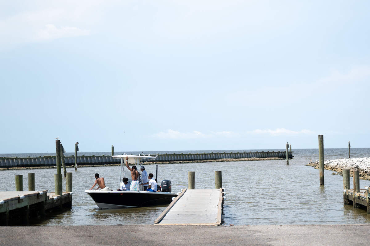 A boat prepares to take off Monday at Lake Mars Boat Launch.