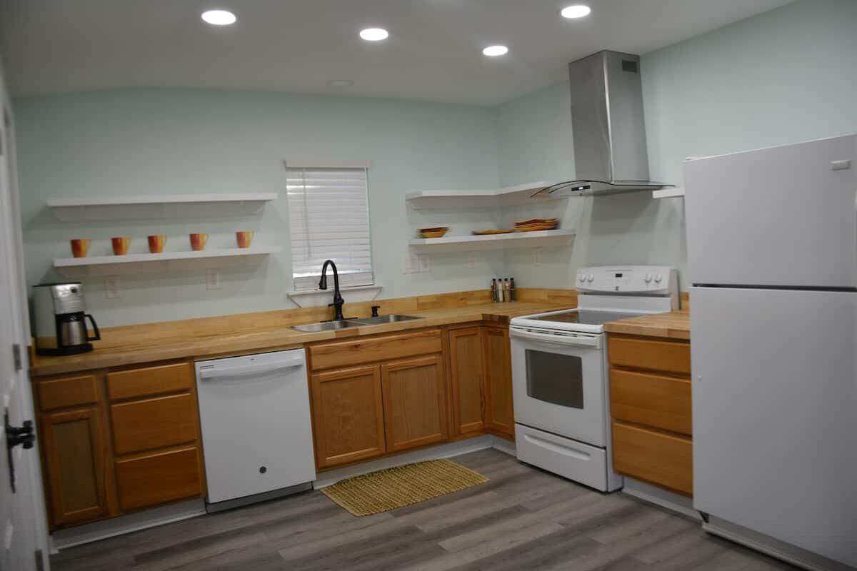 Claudia Salvador remodeled the kitchen and made other improvements to a Gulfport cottage that she rents through Airbnb.