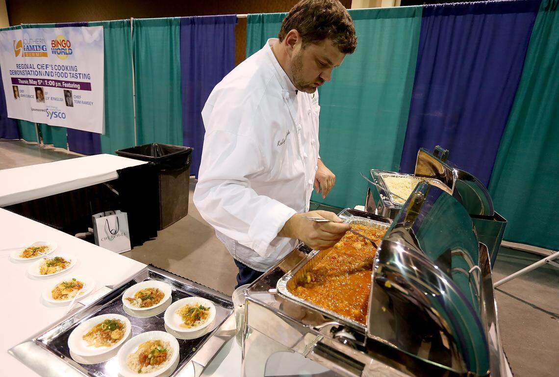 Celebrity chef Kelly English plates shrimp creole during the Regional Chef’s Cooking Demonstration on Thursday, May 5, 2016, at the Southern Gaming Summit in Biloxi. English continues to operate Magnolia House restaurant at Harrah’s Gulf Coast in Biloxi.