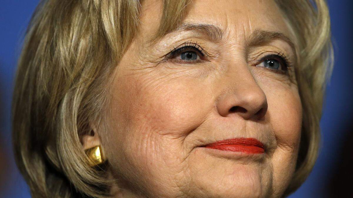 Democratic presidential candidate Hillary Clinton listens to her introduction before she speaks, Wednesday, April 6, 2016, at the Pennsylvania AFL-CIO Convention in Philadelphia. (AP Photo/Matt Rourke)