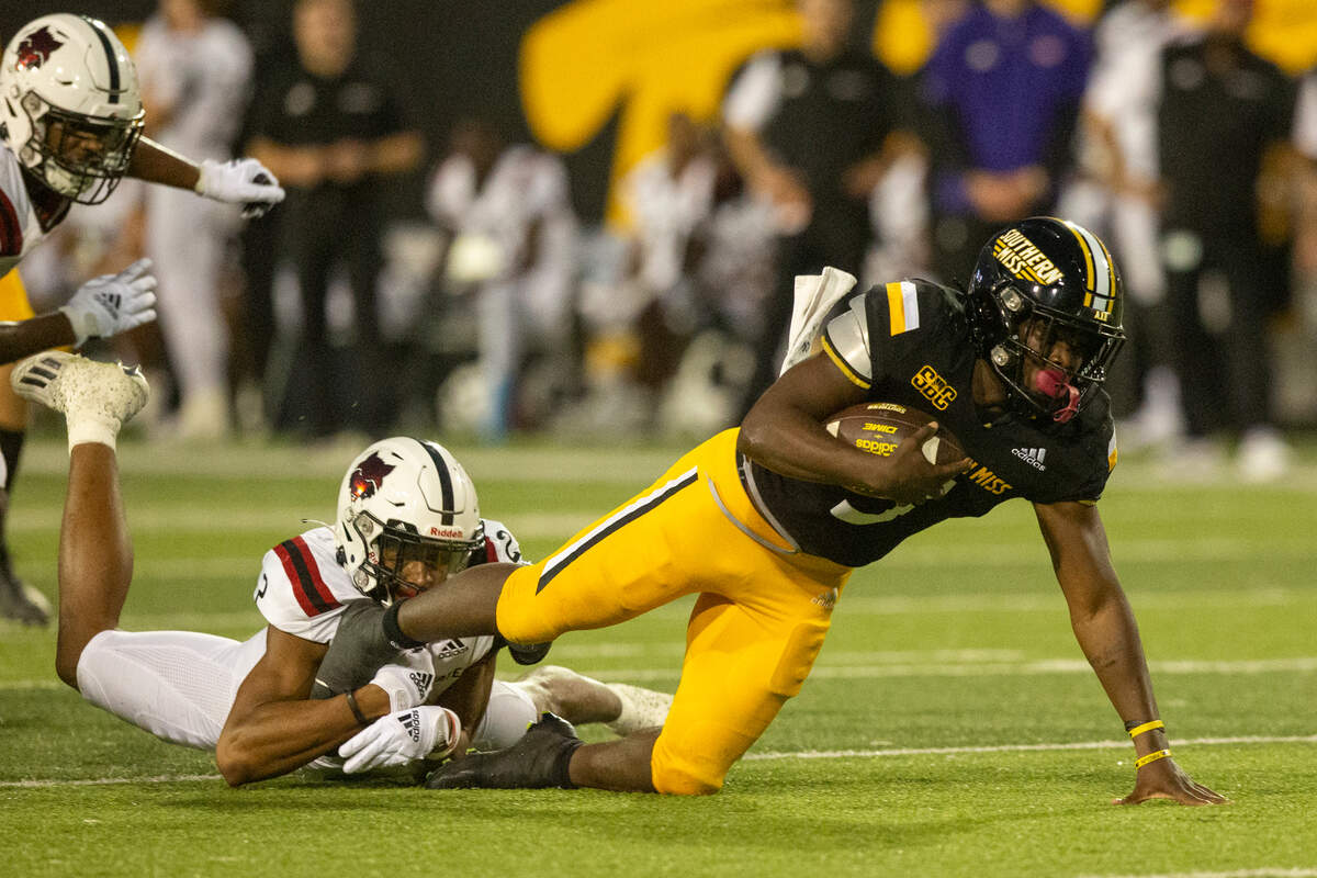 Southern Miss Golden Eagles running back Frank Gore Jr. (3) gets tackled during a game against Arkansas State at M.M. Roberts Stadium in Hattiesburg on Saturday, Oct. 15, 2022.