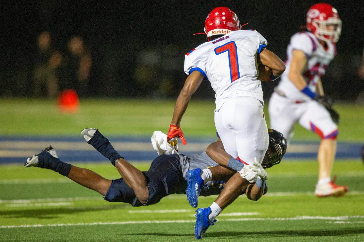 Gautier’s Shamarie Carroll tackles Pascagoula’s Jaden Webb during a game against Pascagoula at Gautier High School in Gautier on Friday, Sept. 2, 2022.