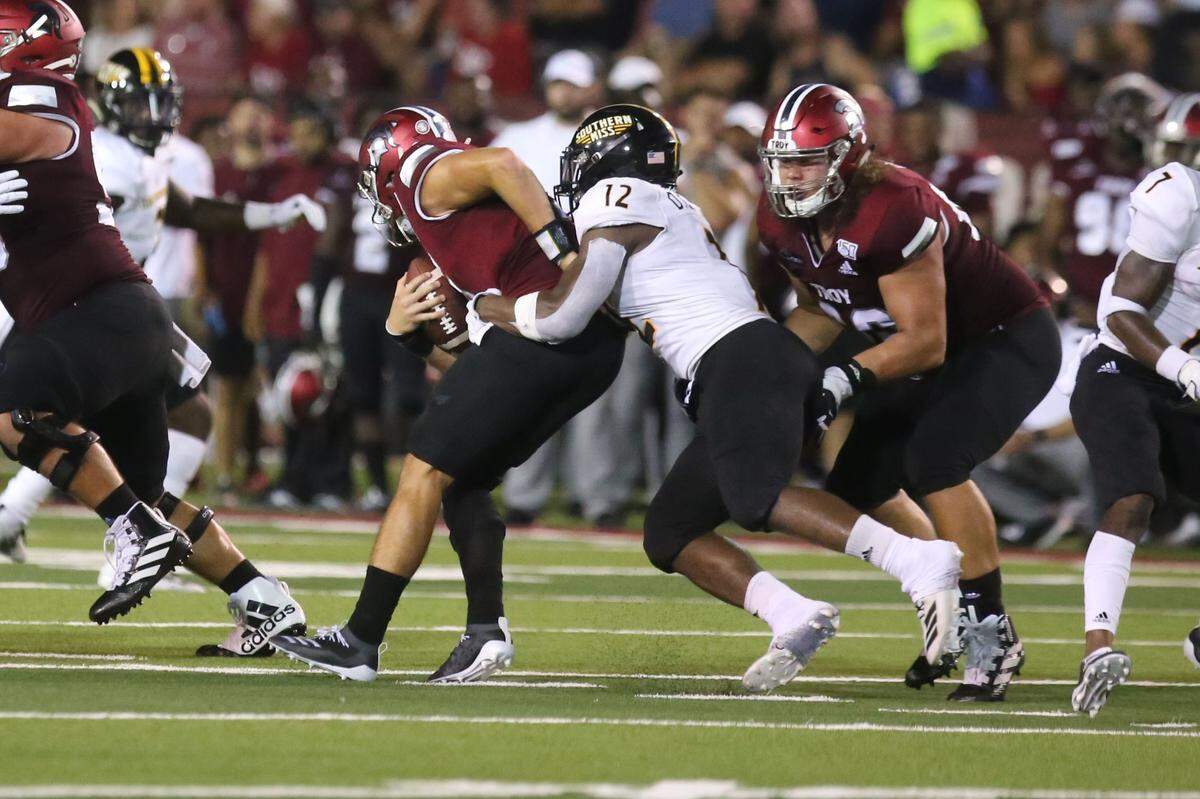 DQ Thomas sacks Troy quarterback Kaleb Barker at Veteran’s Memorial Stadium Sept. 14, 2019.