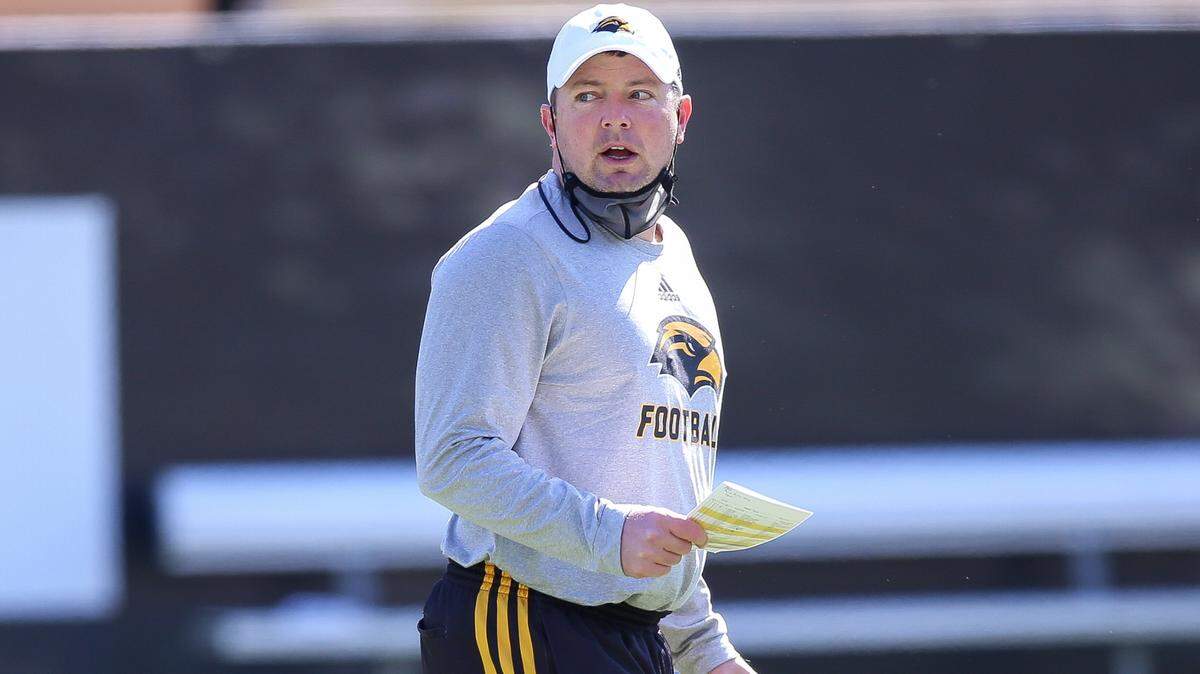 Southern Miss Coach Will Hall watches the football team practice at M.M. Roberts Stadium in Hattiesburg on Saturday, March 6, 2021.