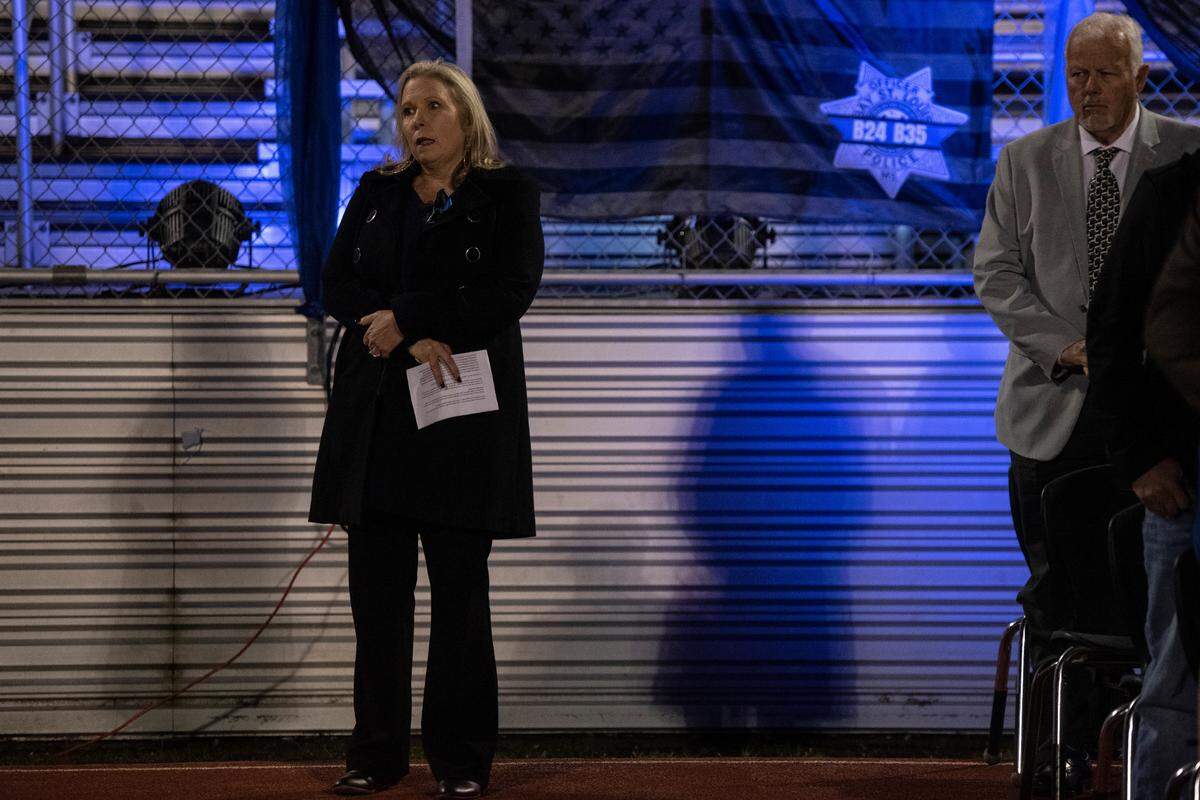 Bay High principal Amy Neicase during a candlelit vigil for Bay St. Louis Sgt. Steven Robin and officer Branden Estorffe at Tiger Stadium in Bay St. Louis on Thursday, Dec. 15, 2022. Robin and Estorffe were killed on Wednesday when a woman shot both of them.