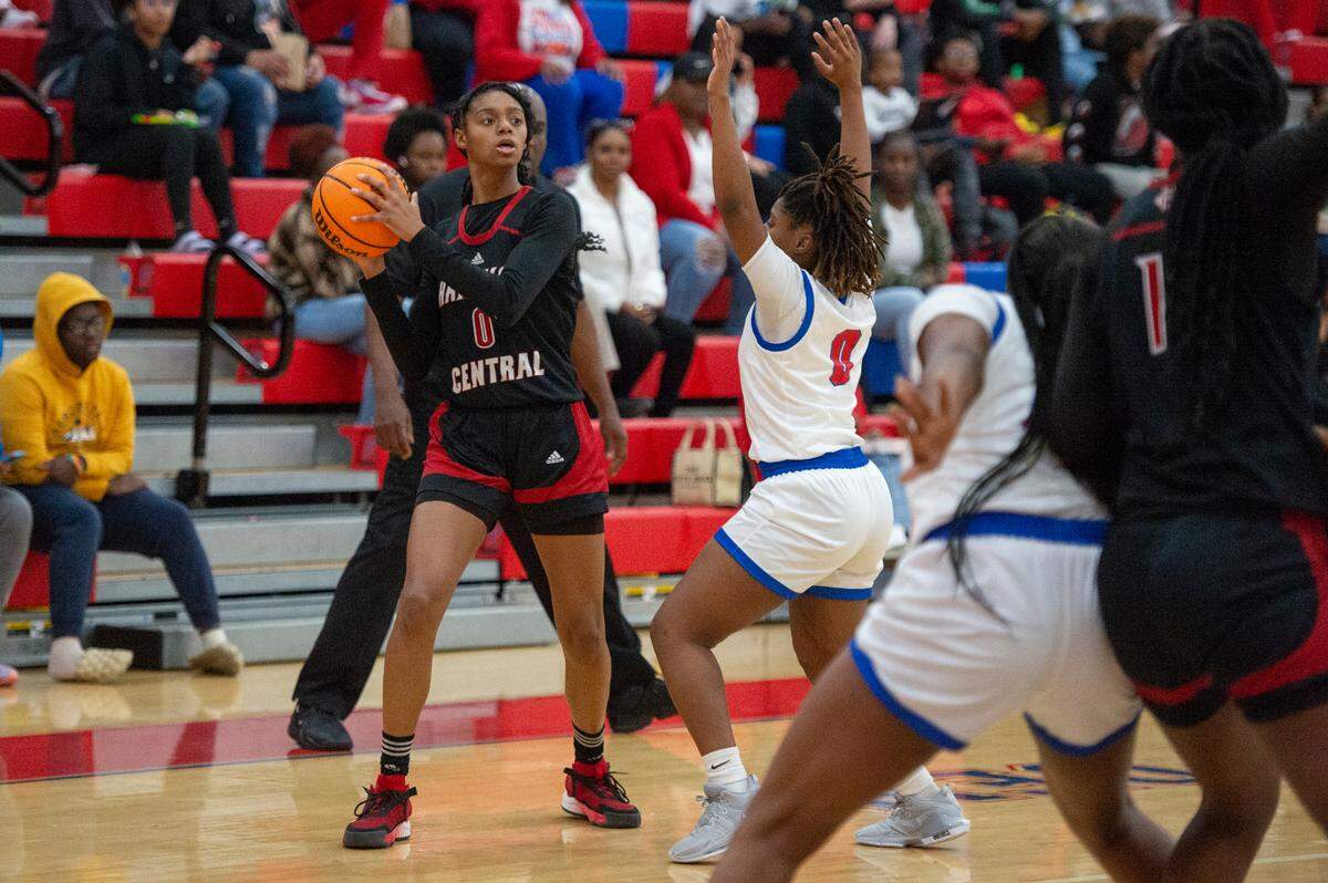 Harrison Central’s Anaisha Carriere looks for a pass during a game against Pascagoula at Pascagoula High School on Tuesday, Dec. 5, 2023.