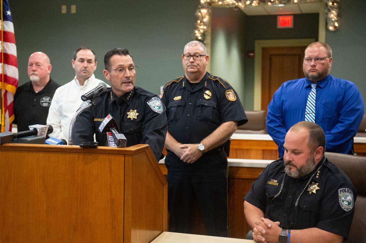Bay St. Louis Police Chief Toby Schwartz reflects on the lives of two fallen police officers during a press conference at the Hancock County administration building in Bay St. Louis on Thursday, Dec. 15, 2022.