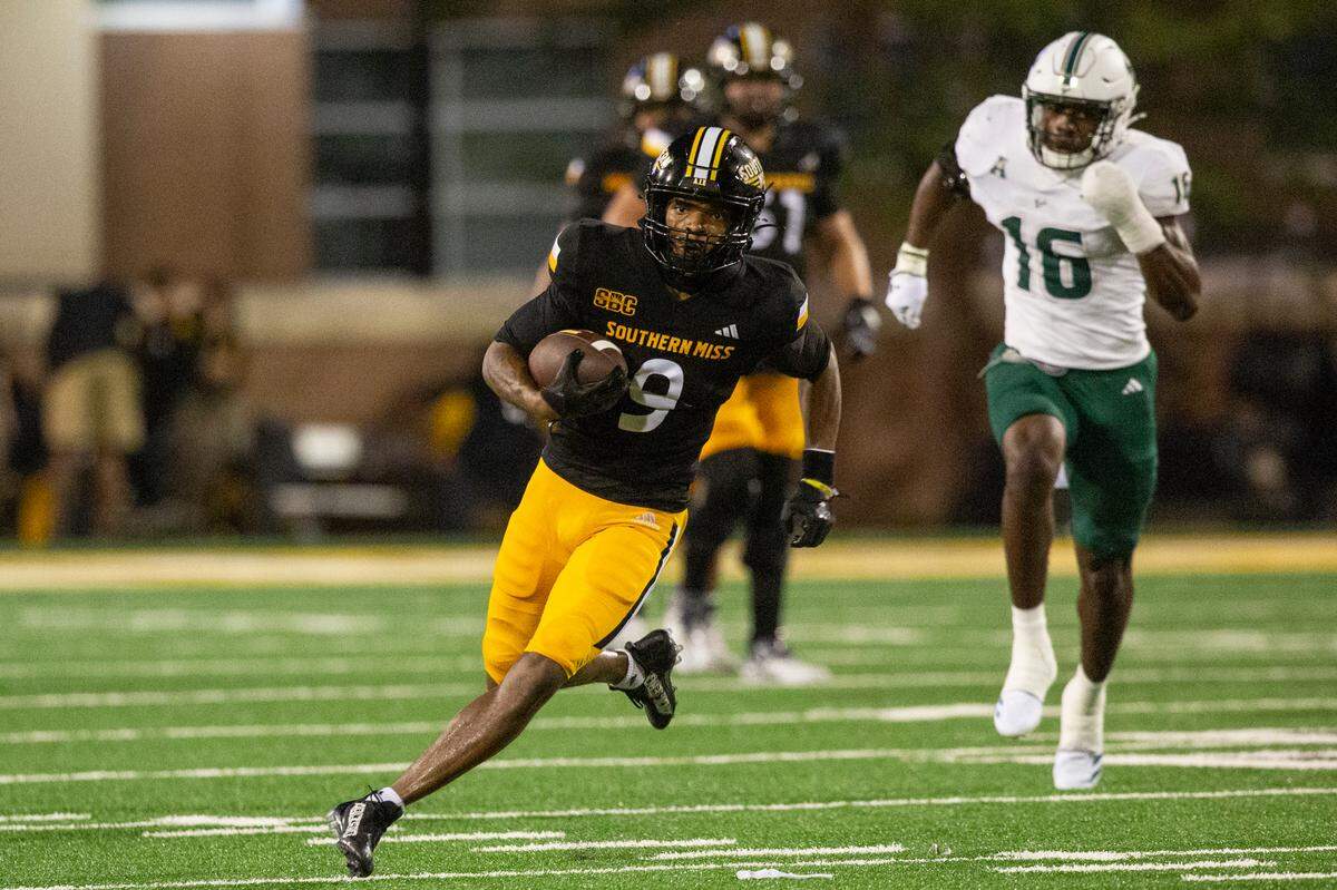 Southern Miss Golden Eagles wide receiver Larry Simmons (9) runs the ball during a game between Southern Miss and South Florida at M.M. Roberts Stadium in Hattiesburg on Saturday, Sept. 14, 2024.